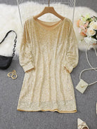 Black Olwen sequin mini dress with round neckline by Lumina Vancouver, shown from the front with a fitted silhouette.