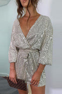 Lavinia sequin wrap mini dress with deep V-neck by Lumina Wear, silver with shimmering sequins and elegant fit.