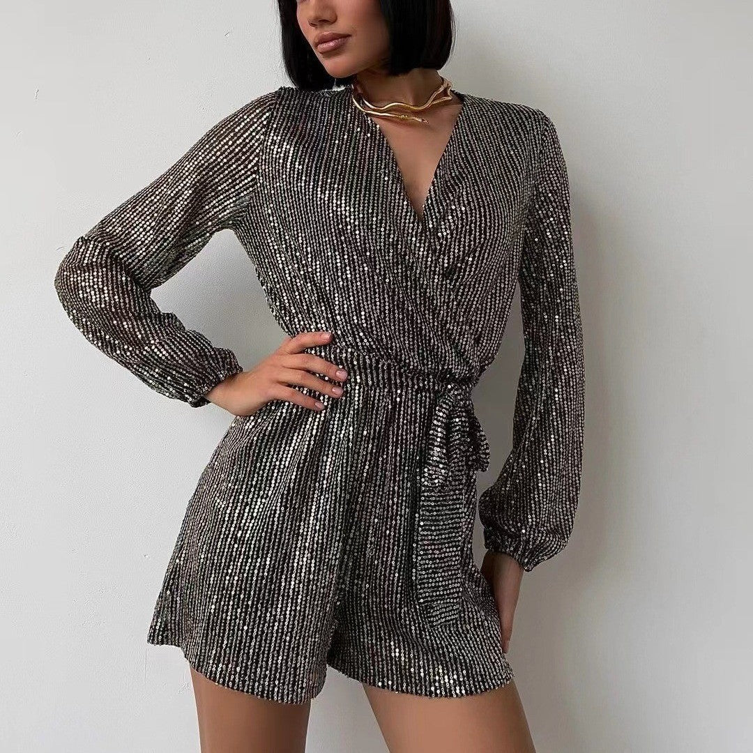 Lavinia sequin wrap dress by Lumina Vancouver featuring a deep V-neck and silver sequins, styled as a mini dress.