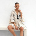 White Nova Lumina shirt dress with deep V-neck collar, mini length, stylish and casual for everyday wear