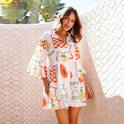 Lumina Wear Nova mini shirt dress with deep V-neck collar in white, stylish and lightweight for casual or dressy occasions.
