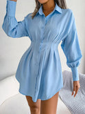 Dark green Nova Lumina tailored mini shirtdress with long sleeves and collar, styled as a chic casual mini dress.