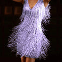 White Nova Lumina Wear sleeveless mini dress with fringe detailing, perfect for stylish summer occasions.