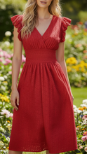 Blue Nova sleeveless V-neck mini dress by Lumina Wear with smocked waist, perfect for casual or semi-formal occasions.