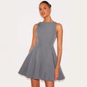 Gray Wilhelmine slim fit sleeveless A-line mini dress by Lumina Wear, displayed on a model with a casual urban background.