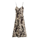 Beige silky satin Aoife slip dress by Lumina Vancouver featuring a V-neck and mini length, shown on a model.