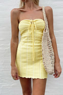 Yellow Nova strapless ribbed mini dress by Lumina Wear, shown on a model with a fitted design and sleeveless style.