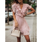 Pink Maren V-Neck Mini Dress with tiered design by Lumina Vancouver, featuring a stylish and feminine silhouette.