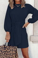White Nova women's mini dress with long sleeves by Lumina Wear, featuring a fitted silhouette and stylish design.