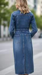 Blue Novae denim mini dress by Lumina Vancouver, tailored fit with stylish design, shown on a mannequin.