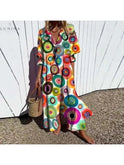 Multicolor Odessa elegant dress by Lumina Wear featuring a flowing design and stylish details, displayed on a mannequin.