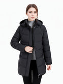 Dark green Olivia Lumina Wear longline hooded puffer coat with quilted design, cozy and stylish for women.