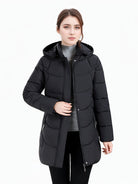 Dark green Olivia Lumina Wear women's longline hooded puffer coat with quilted design, cozy and stylish for winter.