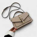 Lumina Wear Olivia elegant mini satchel handbag in khaki with timeless buckle detail, compact size, and stylish design.