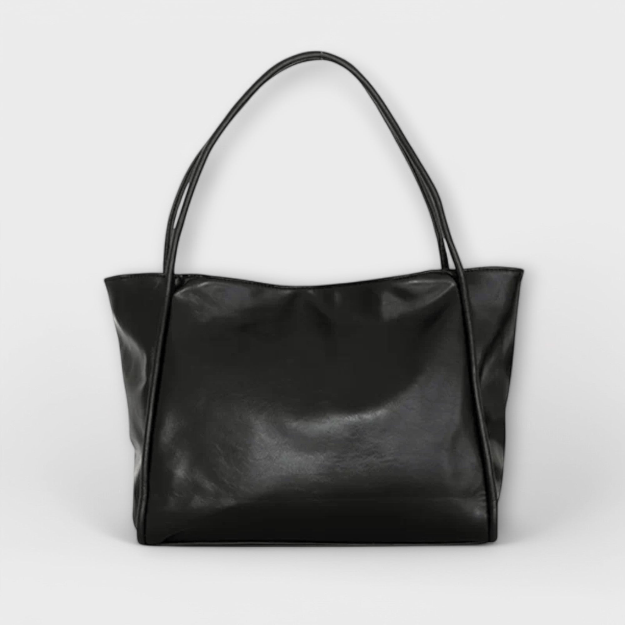 Black Olivia Lumina tote bag with a minimalist design and spacious interior, perfect for everyday use.