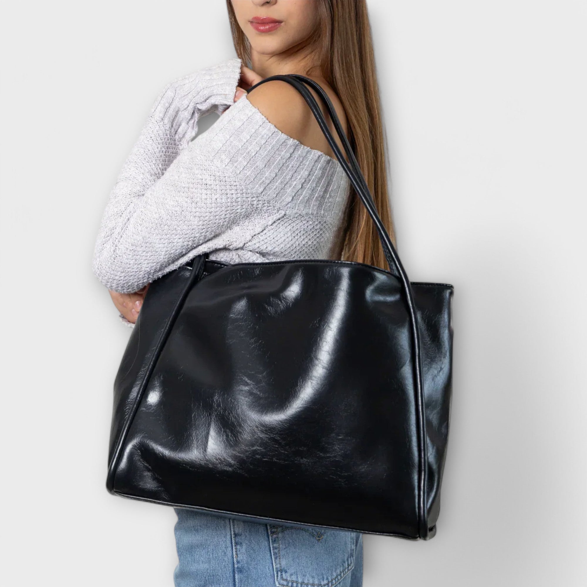 Black Olivia tote by Lumina Wear, a minimalist tote bag with a spacious design perfect for everyday use.