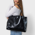 Black Olivia tote by Lumina Wear, a minimalist tote bag with a spacious design perfect for everyday use.