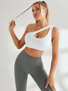 Lumina Vancouver one-shoulder sports bra in white with black and blue accents, designed for athletic support and style.