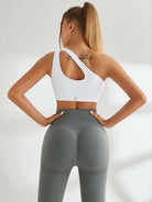 Lumina Vancouver one-shoulder sports ankle bra in white, black, and blue with stylish athletic support for active wear.