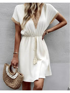 White Paula™ bohemian dress by Lumina Vancouver, featuring flowing fabric and stylish design, perfect for casual or boho-inspired looks.