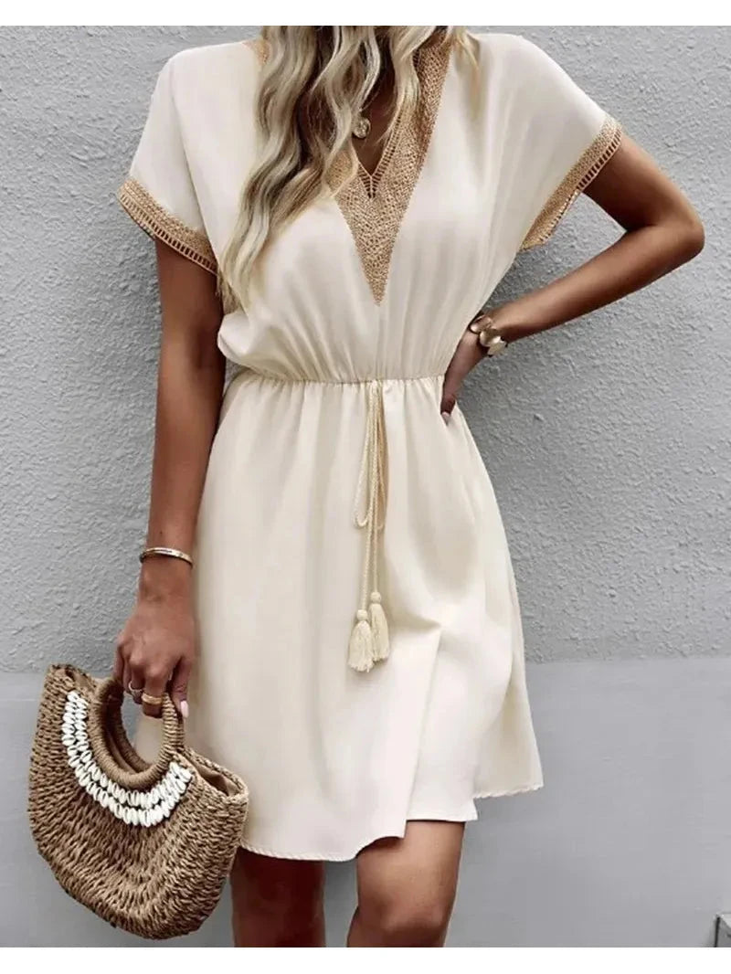 White Paula™ bohemian dress by Lumina Vancouver featuring flowing fabric and relaxed style, perfect for casual or boho-chic looks.