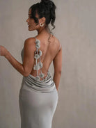 Light green Pauline elegant backless maxi dress by Lumina Vancouver, featuring a sultry, flowing design perfect for formal occasions.