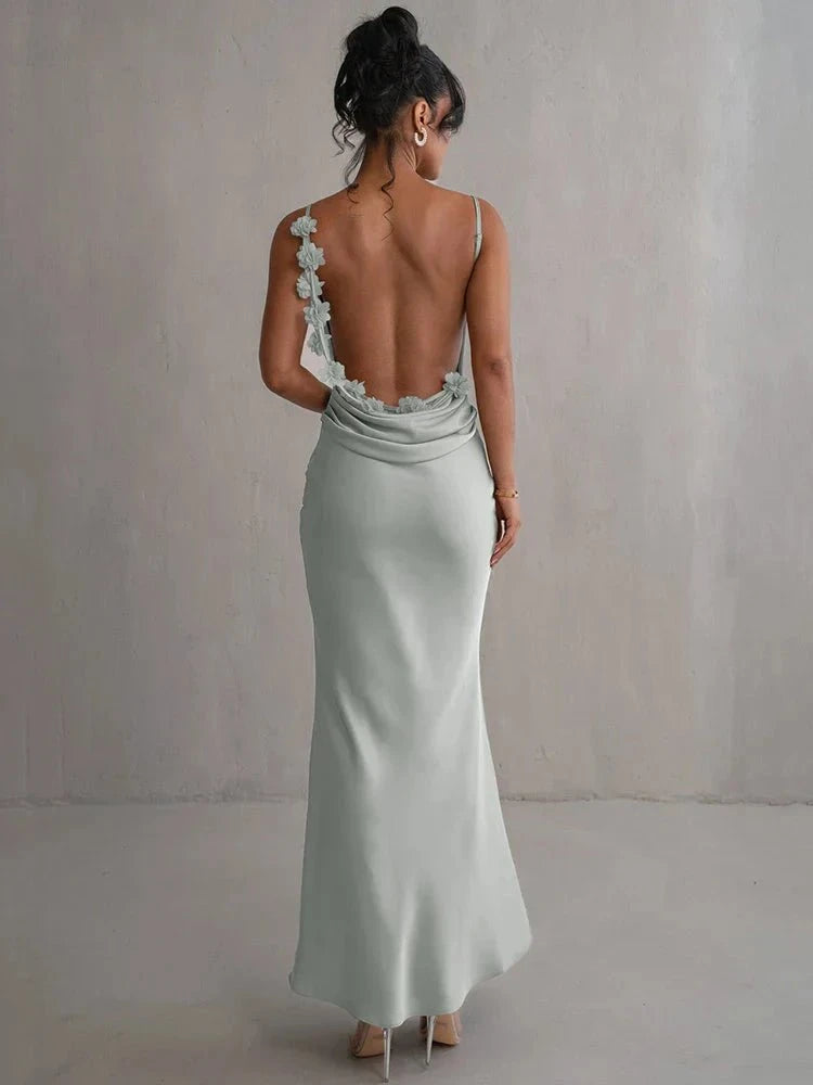 Light green Pauline elegant backless maxi dress by Lumina Vancouver, featuring a flowing silhouette and sultry design for formal occasions.