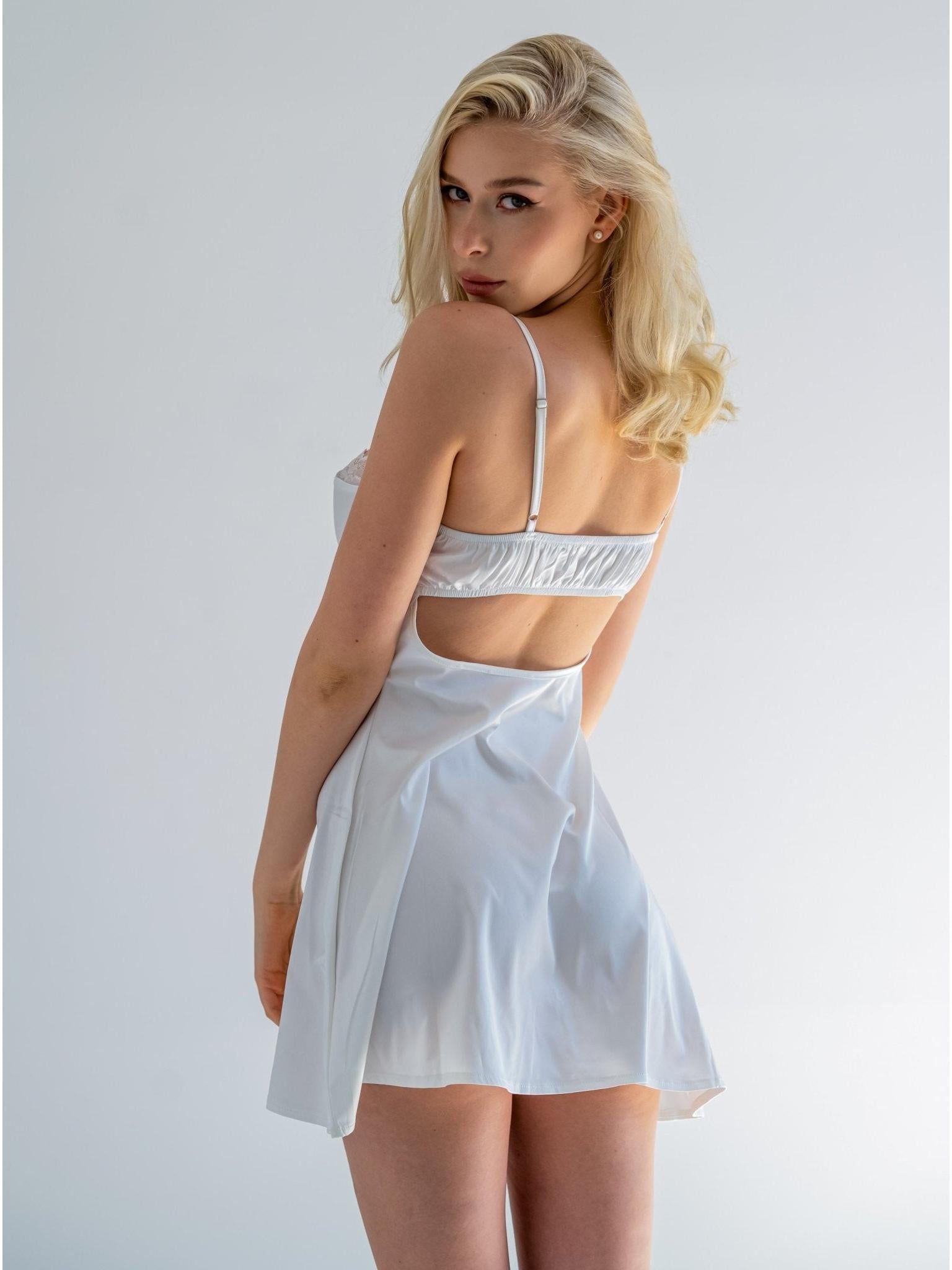 White satin nightdress by Lumina Vancouver featuring a pear-shaped design and elegant, luxurious fabric.