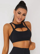 Black Peatacle Sports Bra from Lumina Vancouver featuring supportive, breathable fabric for active wear and athletic workouts.