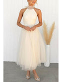 Dark pink Phoebe fancy tulle dress by Lumina Wear, designed for wedding guests, showing its elegant layered tulle fabric.