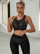 Black Lumina Vancouver PU fishnet breathable sports bra showing its mesh fabric and supportive design for active wear.