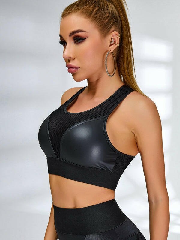 Black PU fishnet breathable sports bra by Lumina Vancouver, designed for comfort and support during athletic activities.
