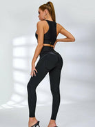 Black PU fishnet breathable sports bra by Lumina Vancouver, featuring a stylish fishnet design and supportive fit for active wear.