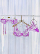 Purple embroidery lingerie set with three pieces from Lumina Vancouver, featuring delicate lace and satin details.