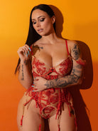 Red Ribbon Sculpting Lingerie Set by Lumina Vancouver, 3-piece red lingerie with sculpting details, displayed on a neutral background.