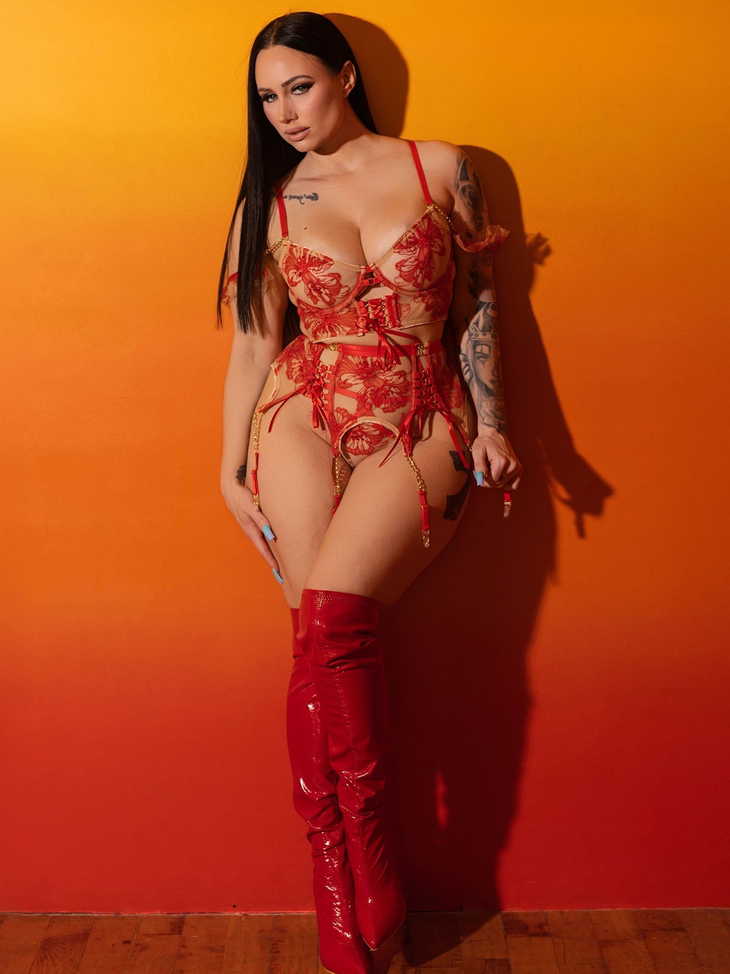 Red Ribbon Sculpting Lingerie Set by Lumina Vancouver, a 3-piece red lingerie set with sculpting design and delicate details.