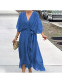 Black elegant loose dress by Lumina Wear, featuring flowing fabric and relaxed fit, perfect for stylish casual wear.