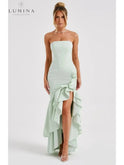 Blue floral sleeveless ruffle maxi dress by Lumina Wear, featuring a slit and elegant design perfect for wedding guests.