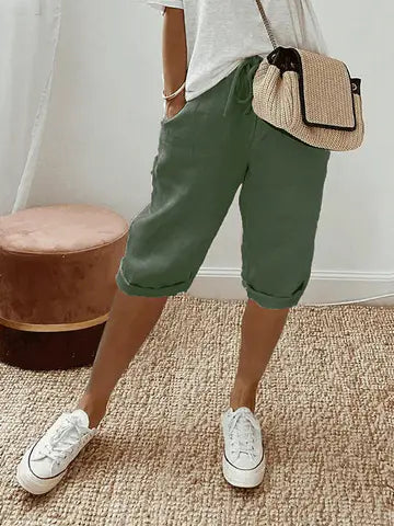 Beige linen blend shorts with adjustable waist from Lumina Wear, featuring a relaxed fit and casual style.