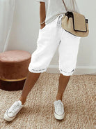 Beige linen blend shorts with adjustable waistband from Lumina Wear, featuring a relaxed fit and casual style.