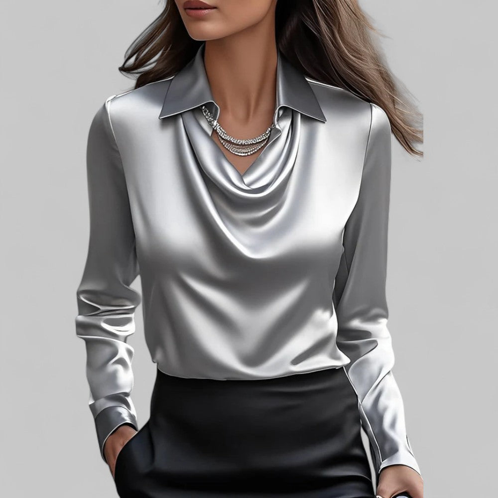 Elegant white women's blouse by Lumina Wear with a draped neckline and long sleeves, perfect for sophisticated fashion.