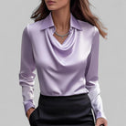 Elegant white rose-colored blouse with draped neckline and long sleeves by Lumina Wear, stylish women's blouse for casual or formal wear.