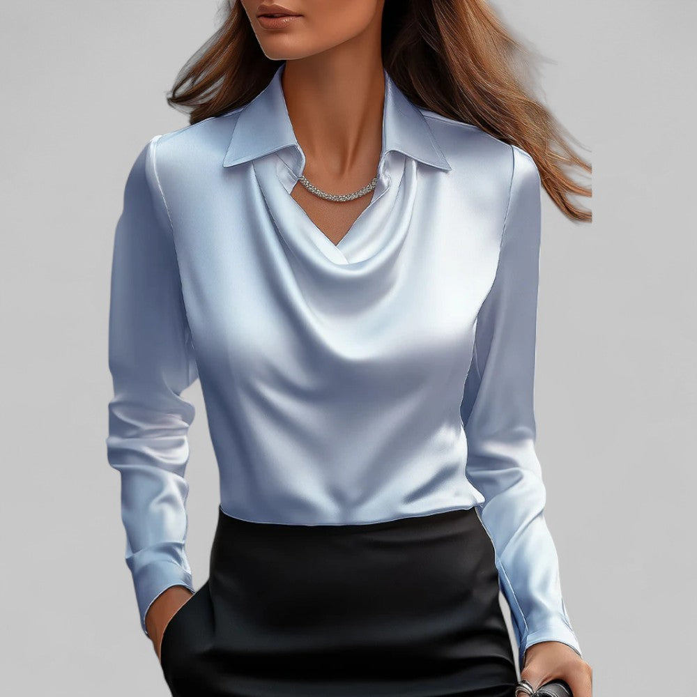 White women's blouse with elegant draped neck and long sleeves by Lumina Wear, featuring a soft rose-colored fabric and stylish fit.