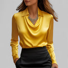 White women's blouse by Lumina Wear featuring a rose pattern, elegant draped neck, and long sleeves.