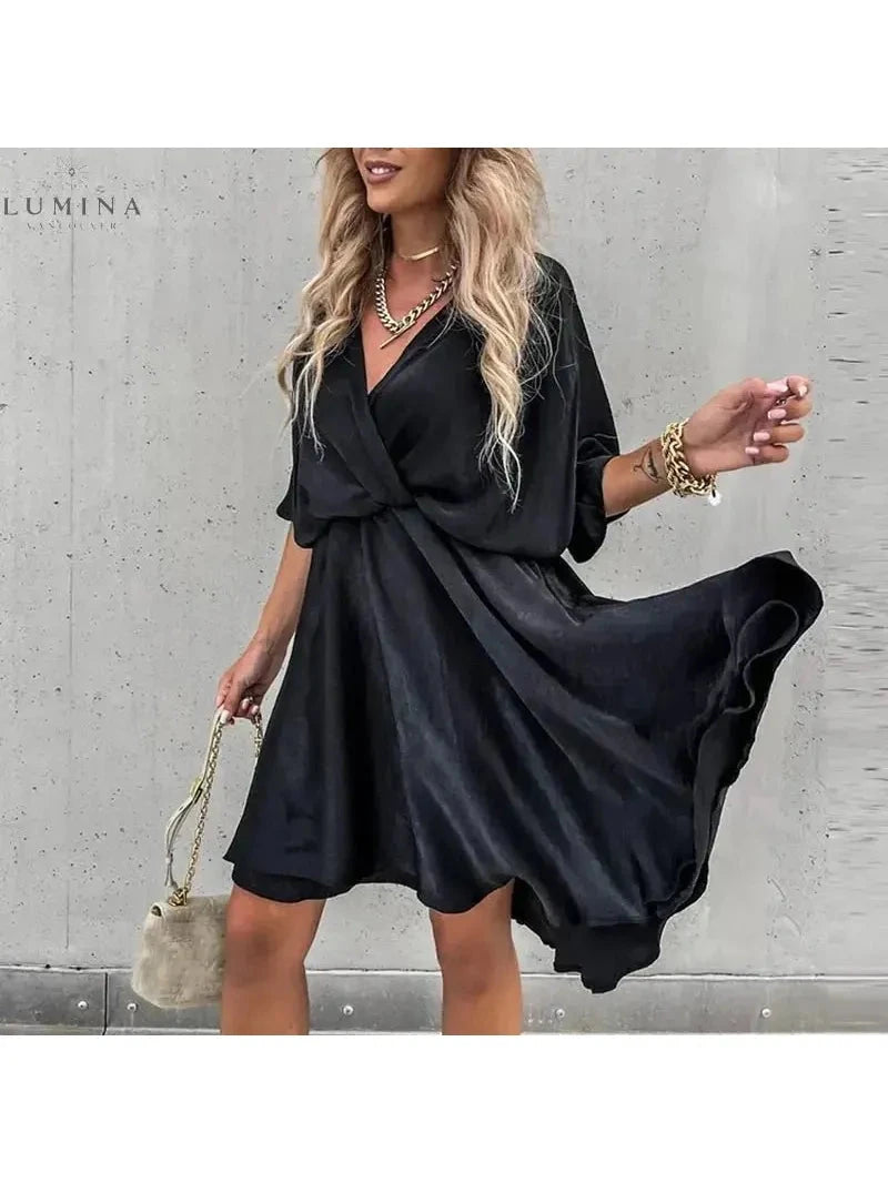 Pink rose-colored elegant wedding guest dress by Lumina Vancouver, featuring a stylish design perfect for special occasions.