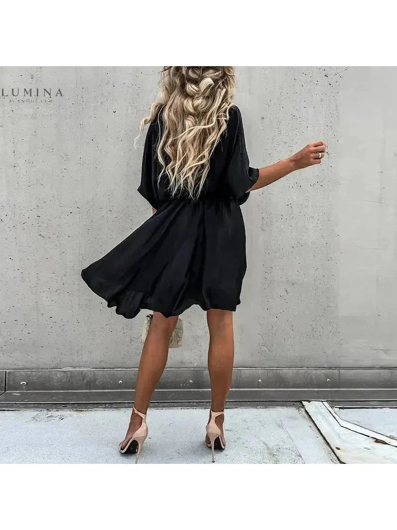 Pink rose-colored elegant wedding guest dress by Lumina Vancouver, featuring a stylish and sophisticated design for special occasions.