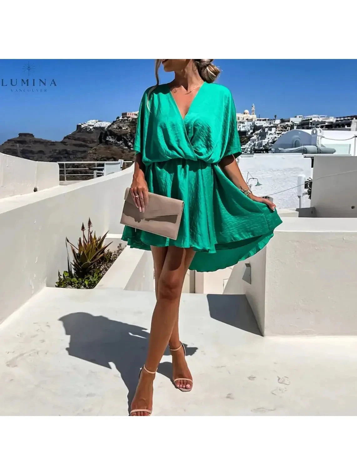 Pink rose-colored elegant wedding guest dress by Lumina Vancouver, featuring a flattering fit for size 8-10.