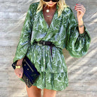 Green Theotiste Serenity V-Neck Wrap Dress by Lumina Vancouver, mini length, fitted waist, elegant and stylish for casual or dressy occasions.