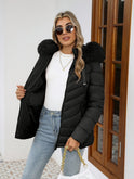 Black Lumina Wear Ruby quilted puffer jacket with faux-fur hood, designed for women, featuring cozy insulation and stylish details.