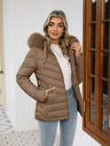 Black Lumina Wear Ruby cozy quilted puffer jacket with faux-fur hood, designed for women, featuring a warm, stylish winter coat.